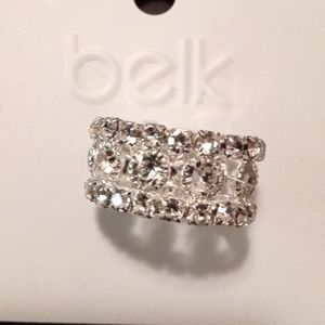 Elegant stretchy ring with artificial stones.  VERY sparkly.